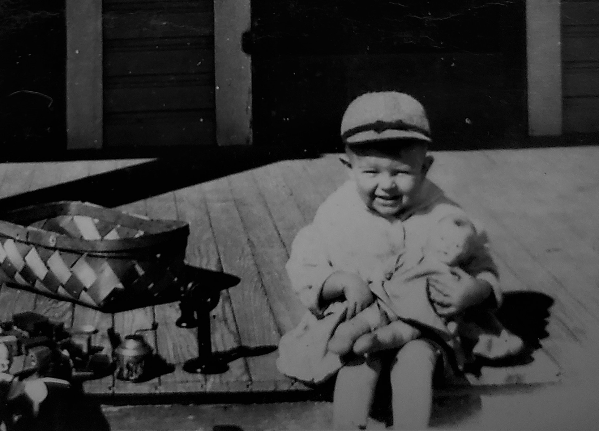 1927-2 Little Rock Quinton with toys holding doll (2)